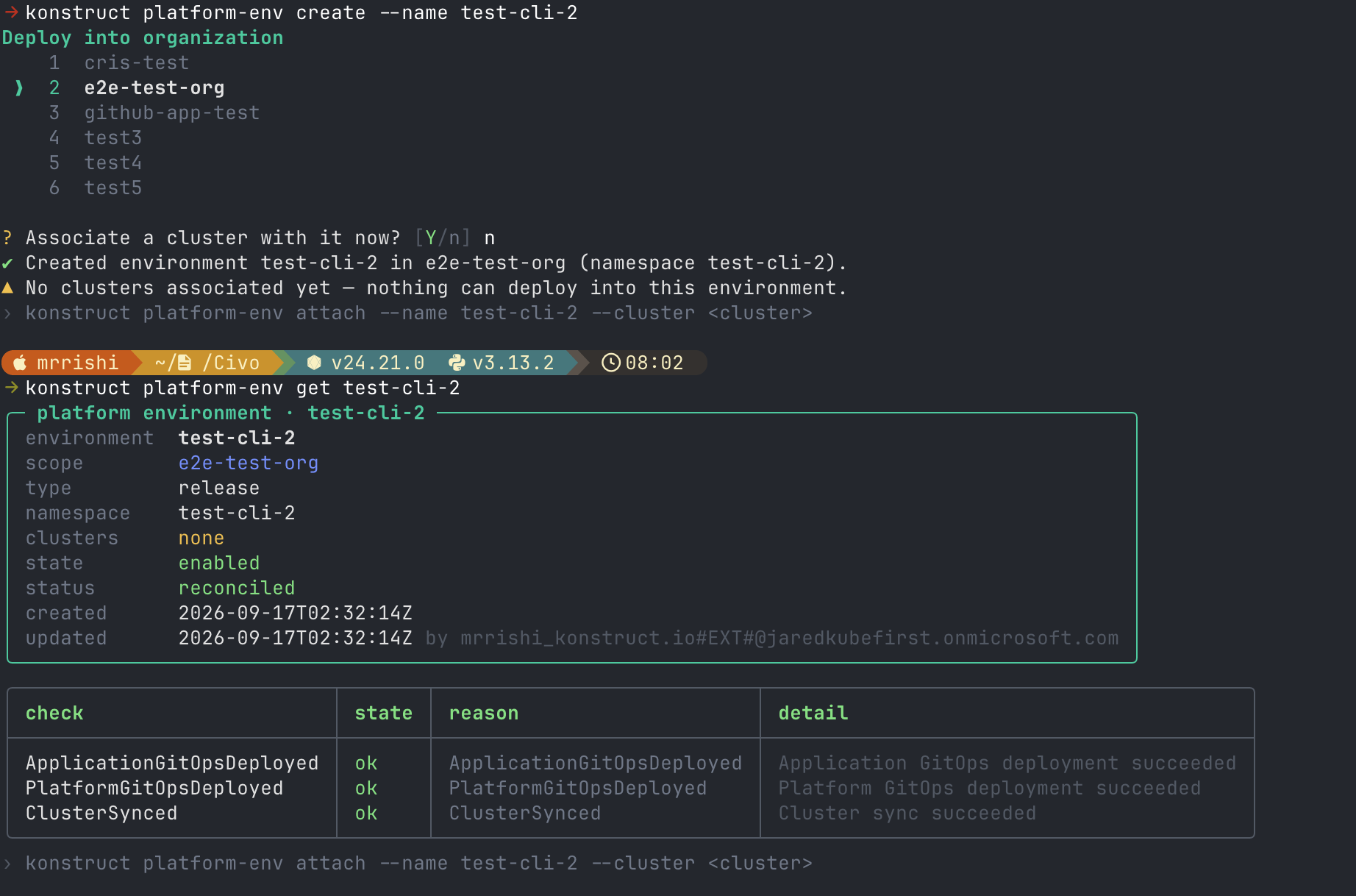 Terminal showing a prompt to pick an organization, a declined offer to associate a cluster, and a warning that nothing can deploy yet, then the environment reported as enabled and reconciled with no clusters